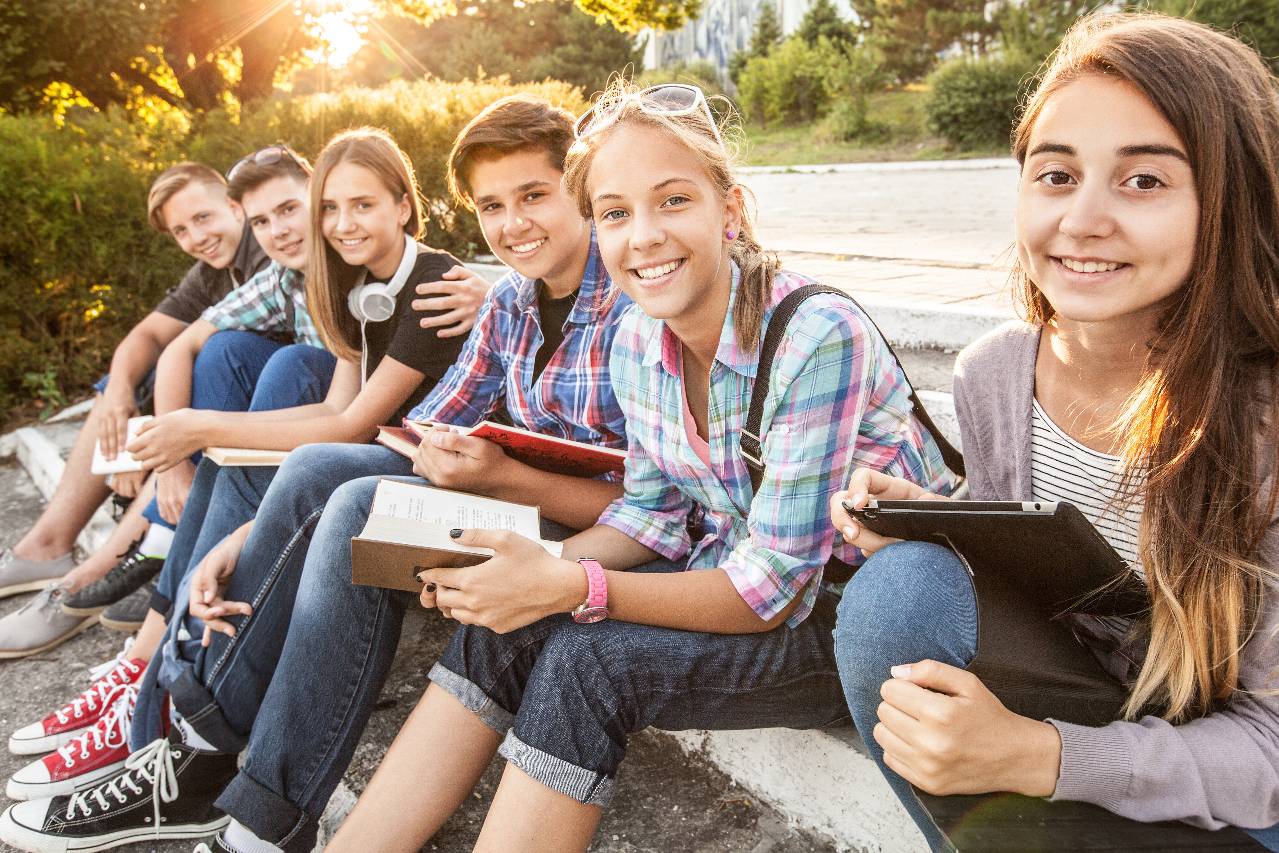 Information about the 2026 grammar school entrance exam (Gymiprüfung) is what the pupils sitting together as a group on a staircase and smiling at the camera could really use here.