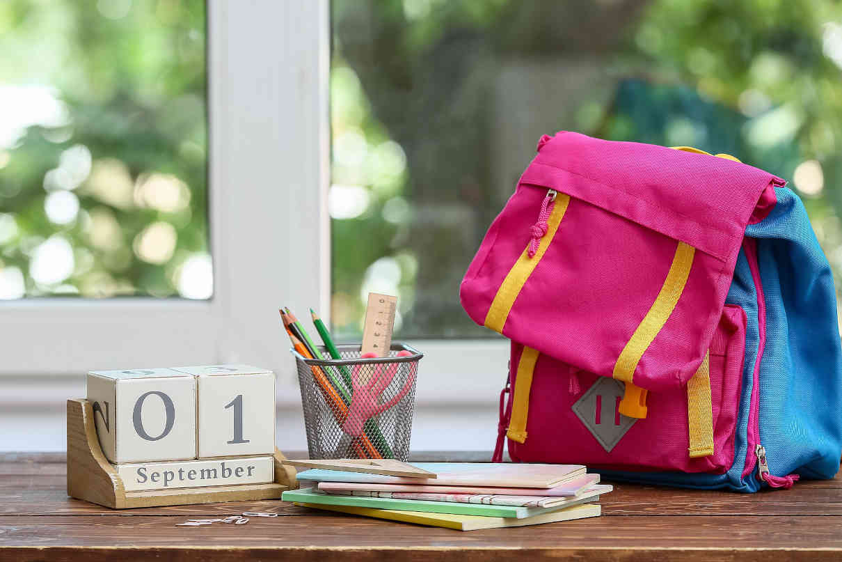 When to start grammar school preparation: The calendar on the table with school bags shows that you have to pay attention to the right time.